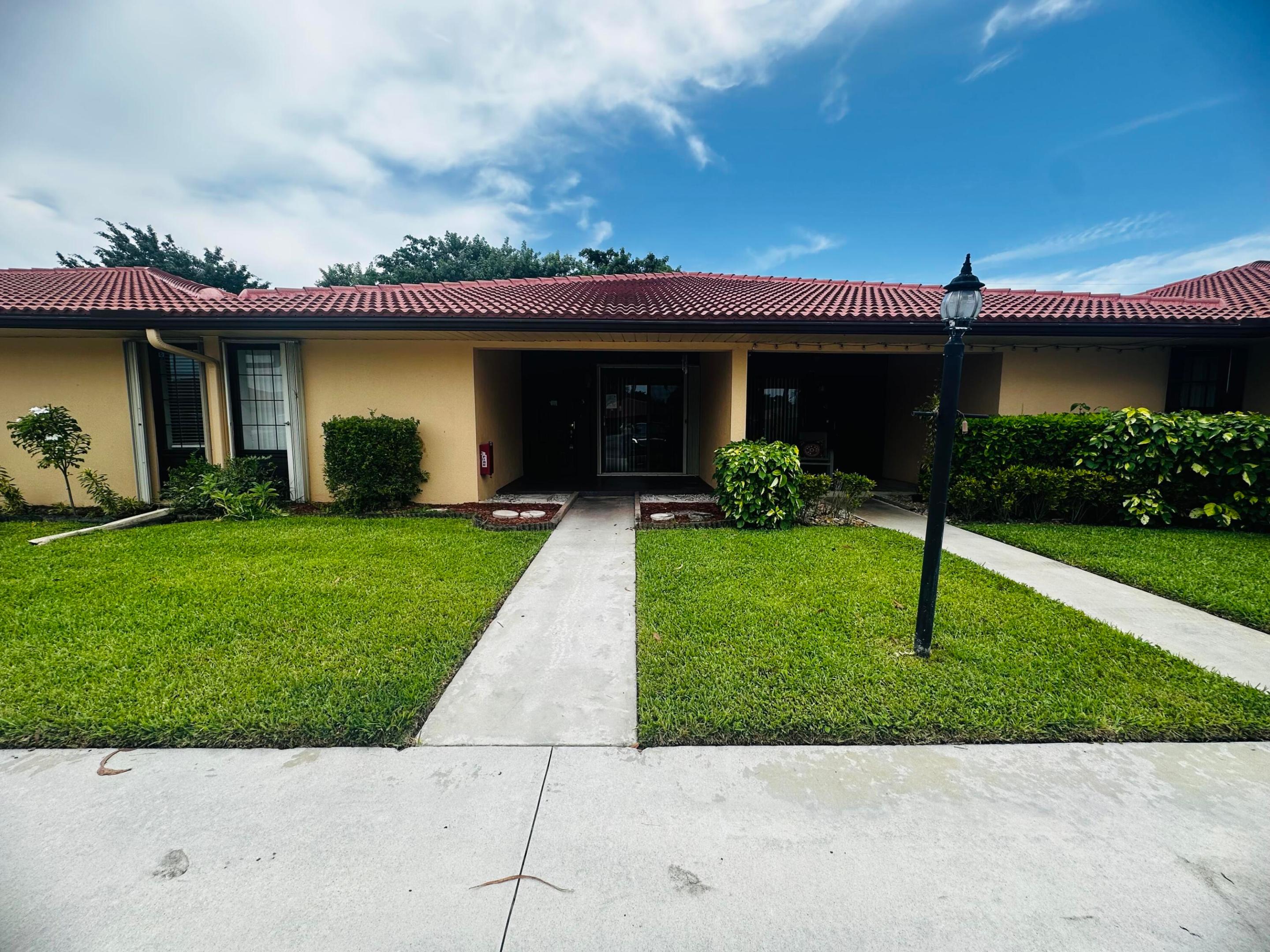 5933 FOREST HILL Boulevard 3 Property Photo 1