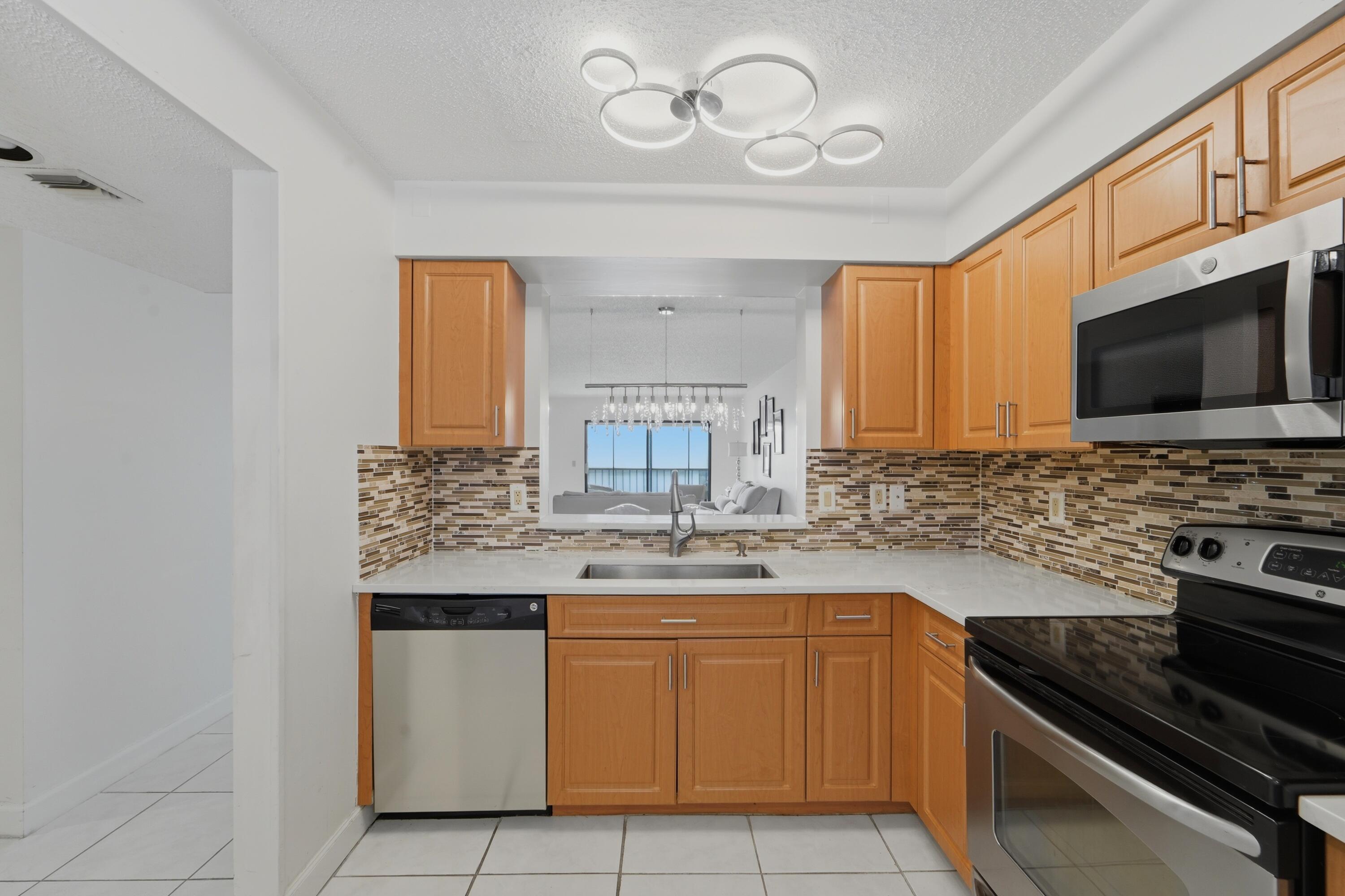 6093 POINTE REGAL Circle 209 Property Photo 1