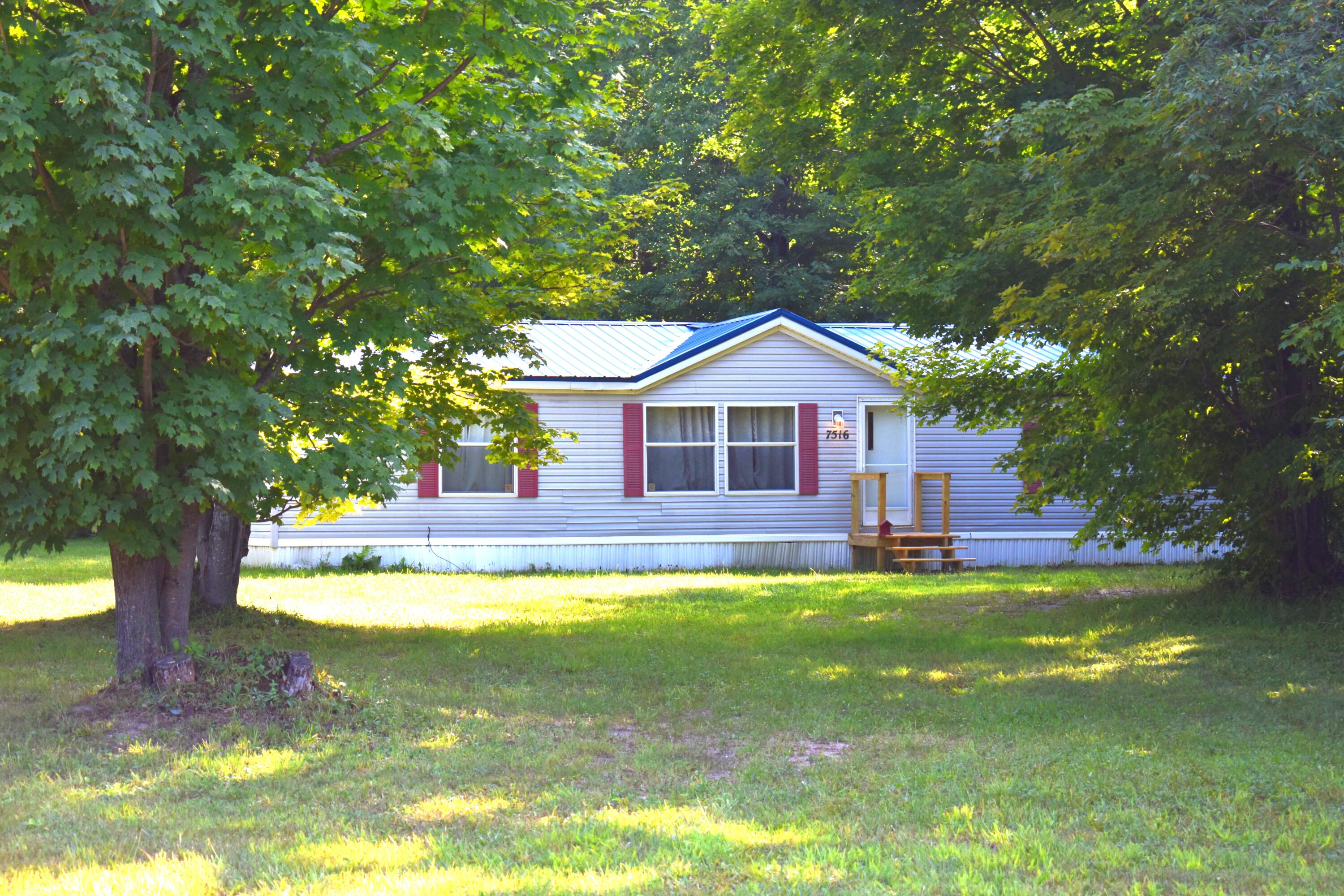 7516 Covert Road Ne Property Photo 1