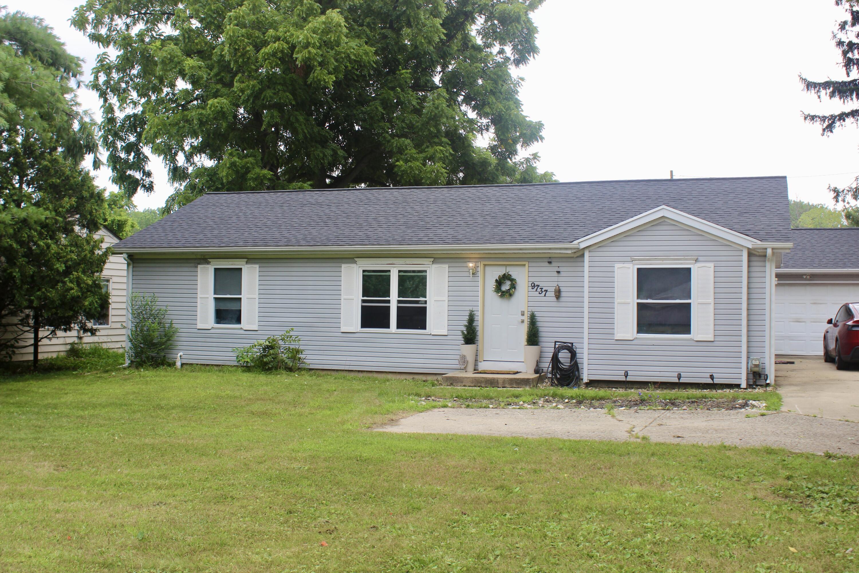 9737 S Sprinkle Road Property Photo 1
