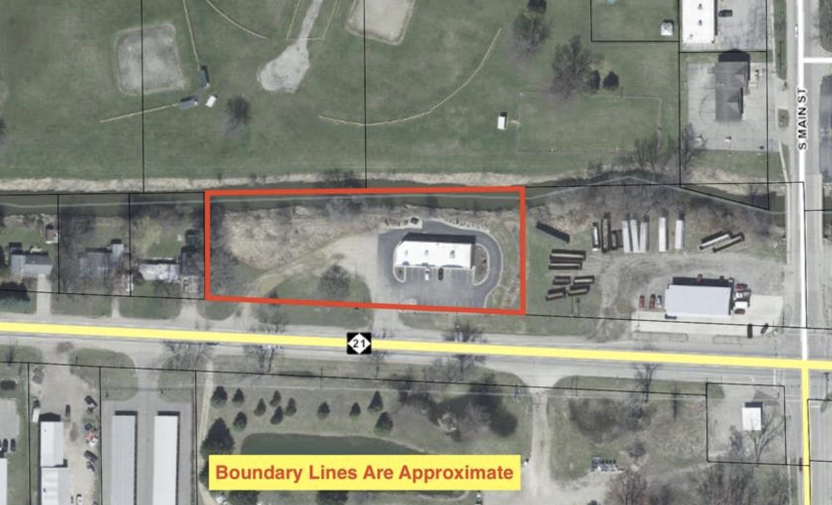 9595 E M-21 Highway Property Photo 1