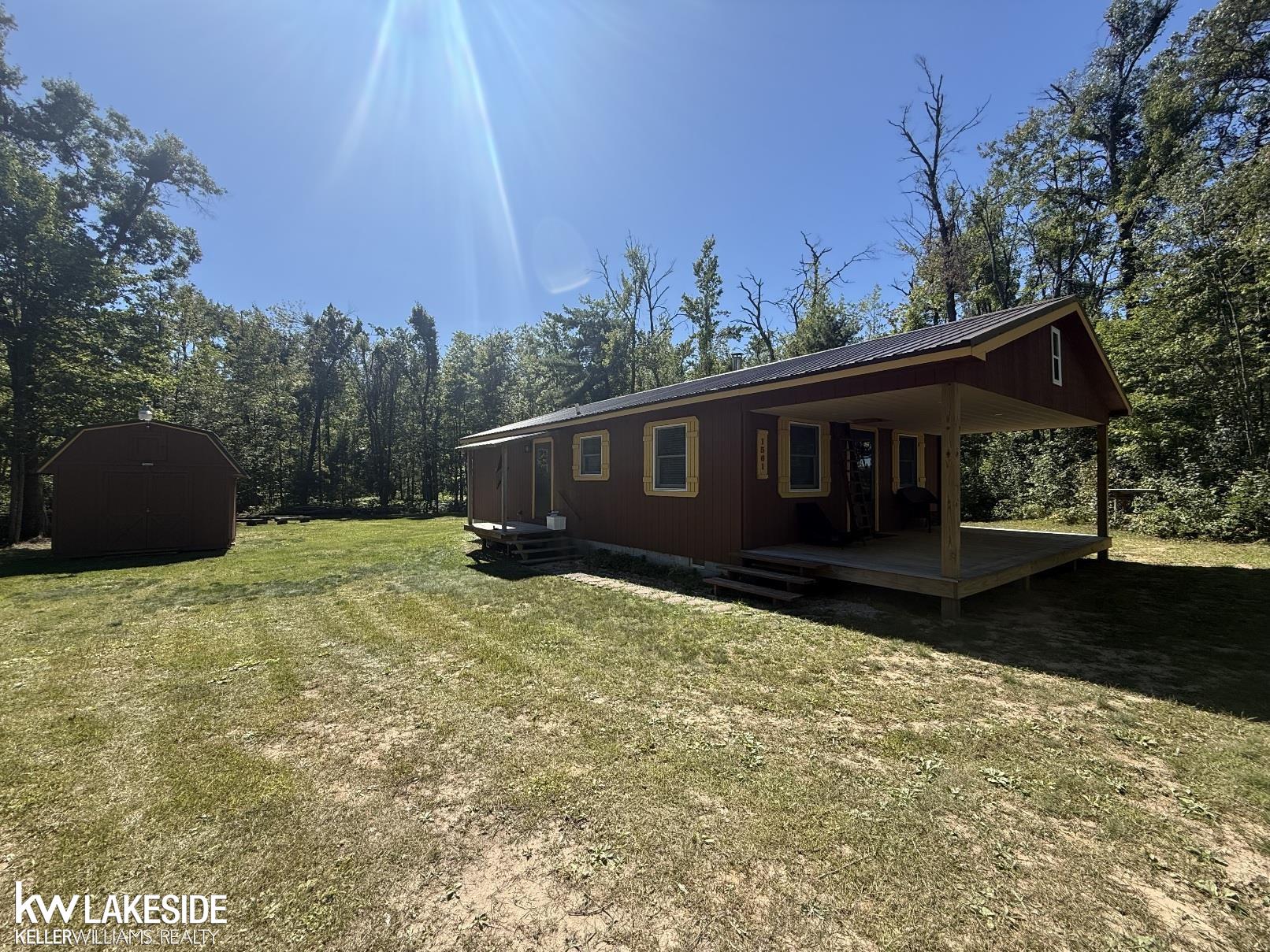 1561 W Helmer Lake Road Property Photo 1