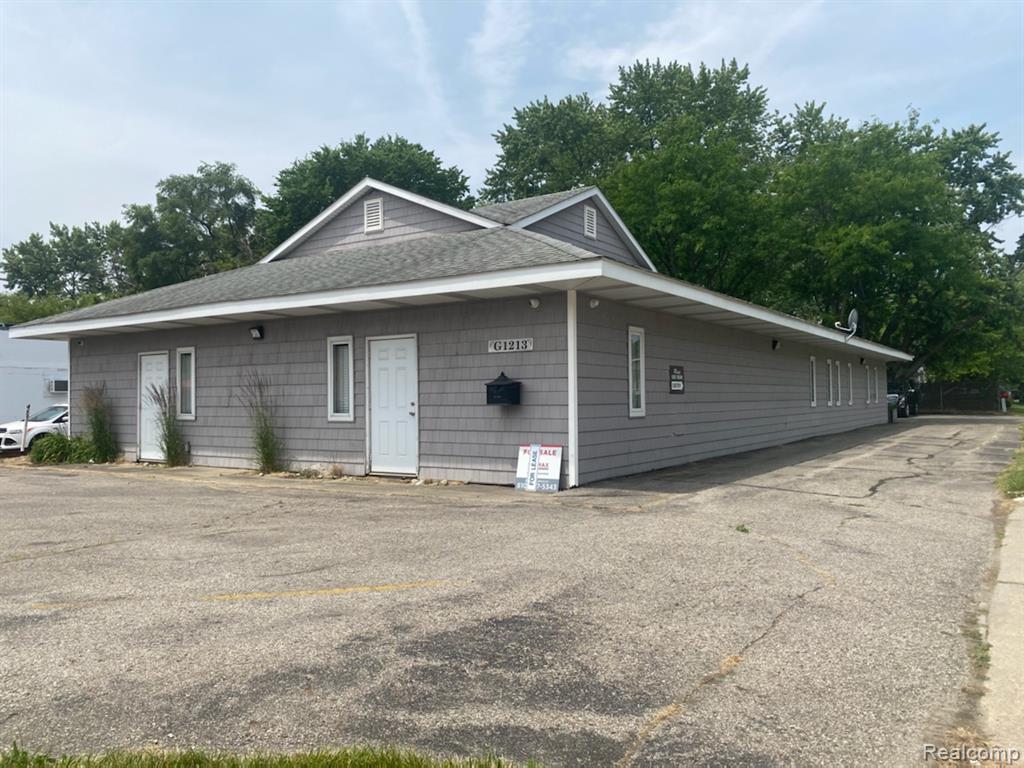 1213 N BALLENGER Highway Property Photo 1