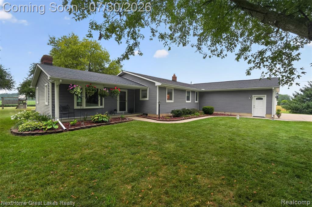 6249 New Lothrop Road Property Photo 1