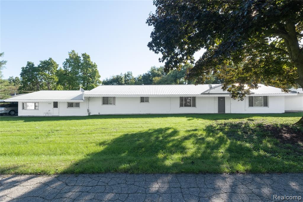 7038 Whitmore Lake Road Property Photo 1