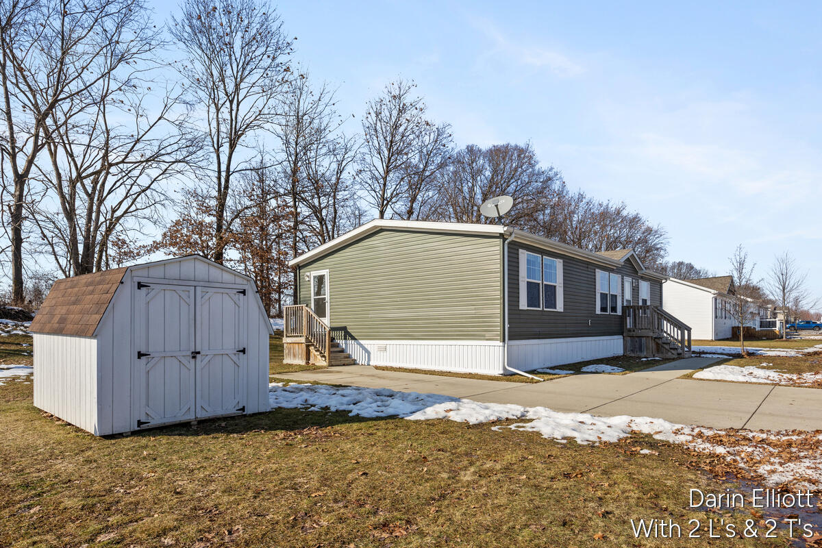 7204 E Grand River Avenue Property Photo 1