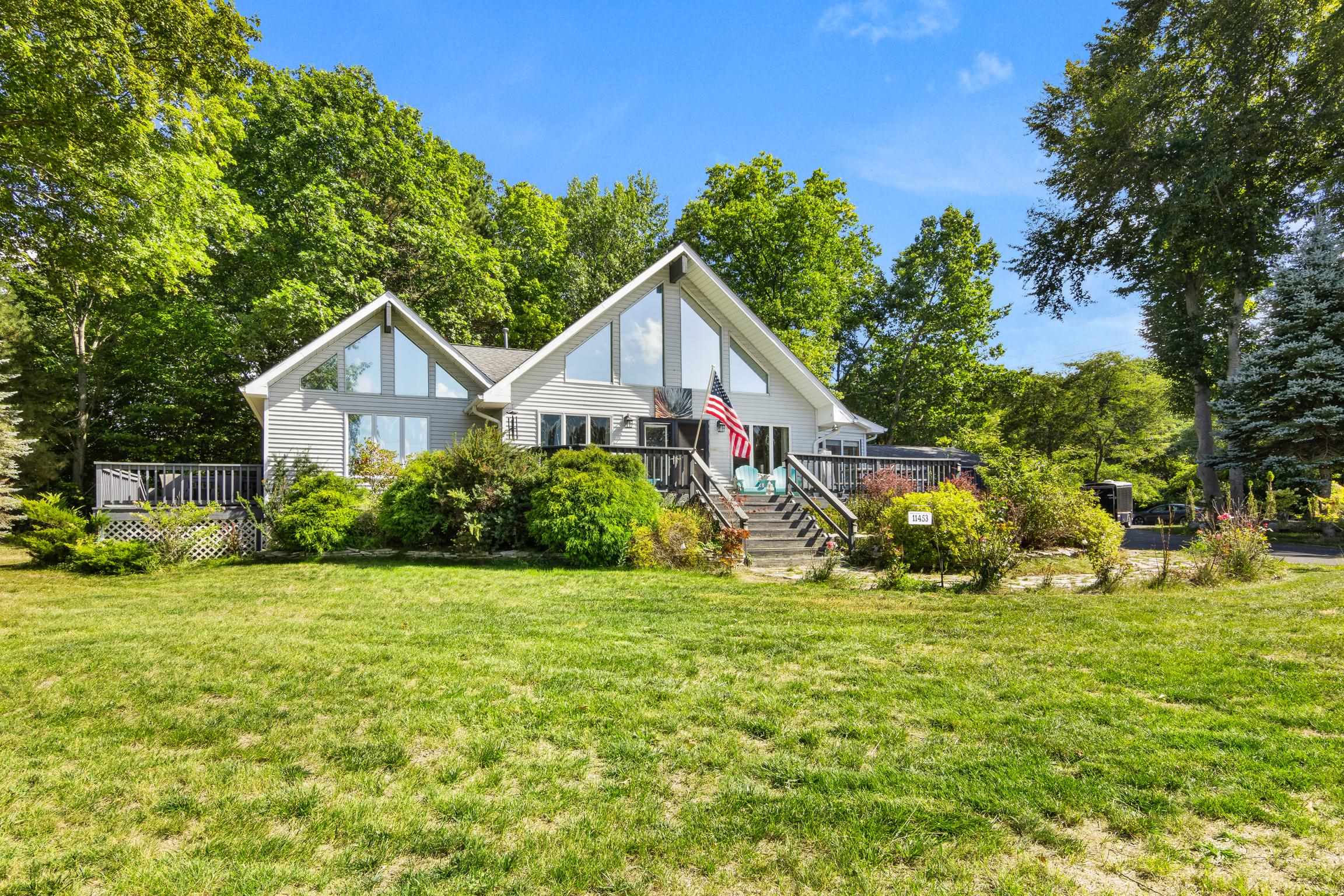 11453 S East Torch Lake Drive Property Photo 1