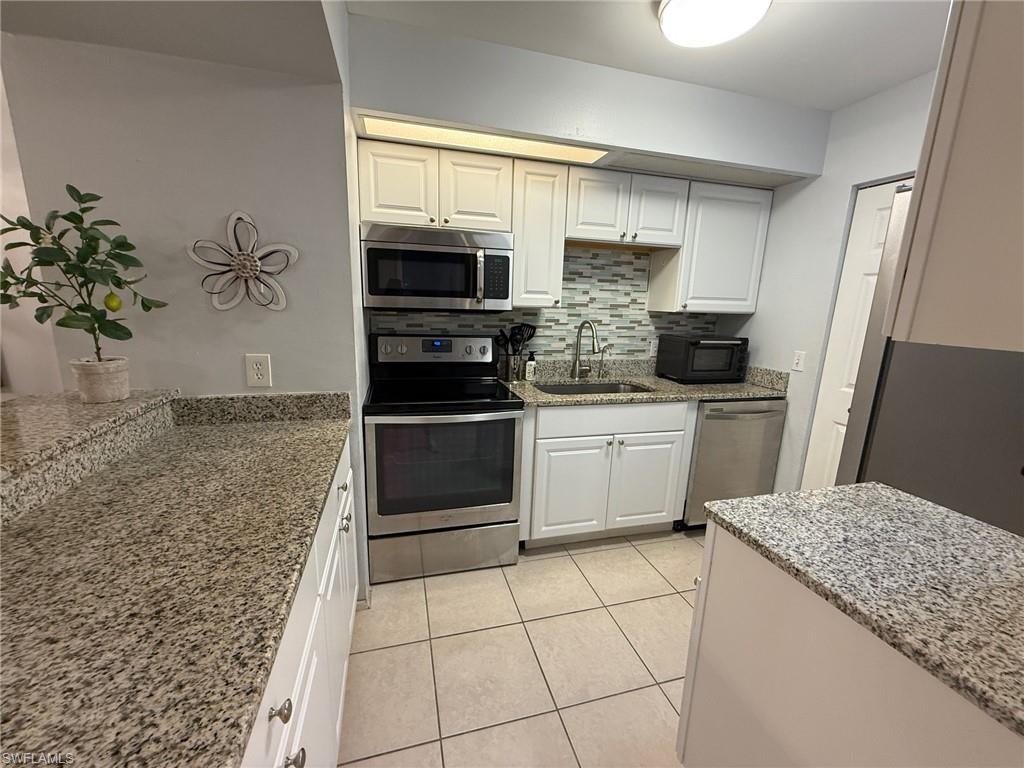 14900 Summerlin Woods DR 13 Property Photo 1