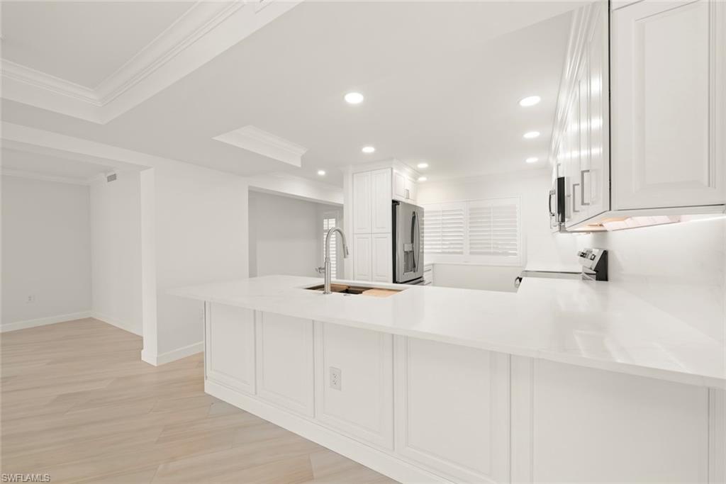 200 Periwinkle Way 111 Property Photo 4
