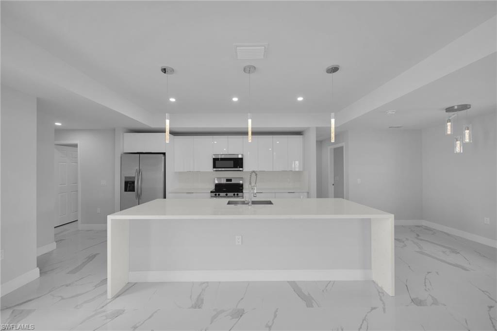 1102 Santa Barbara Blvd N Property Photo 5