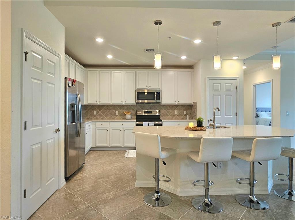 11768 Grand Belvedere Way # 103 Property Photo 3