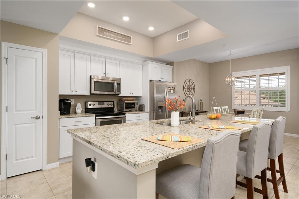 10740 Palazzo WAY # 404 Property Photo 1