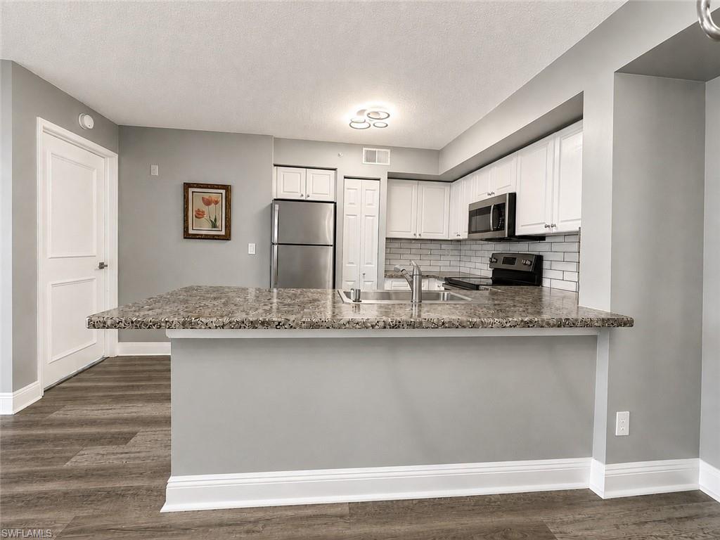1240 Wildwood Lakes BLVD 203 Property Photo 1