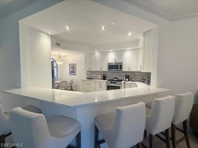 7056 Pelican Bay Blvd B102 Property Photo 2