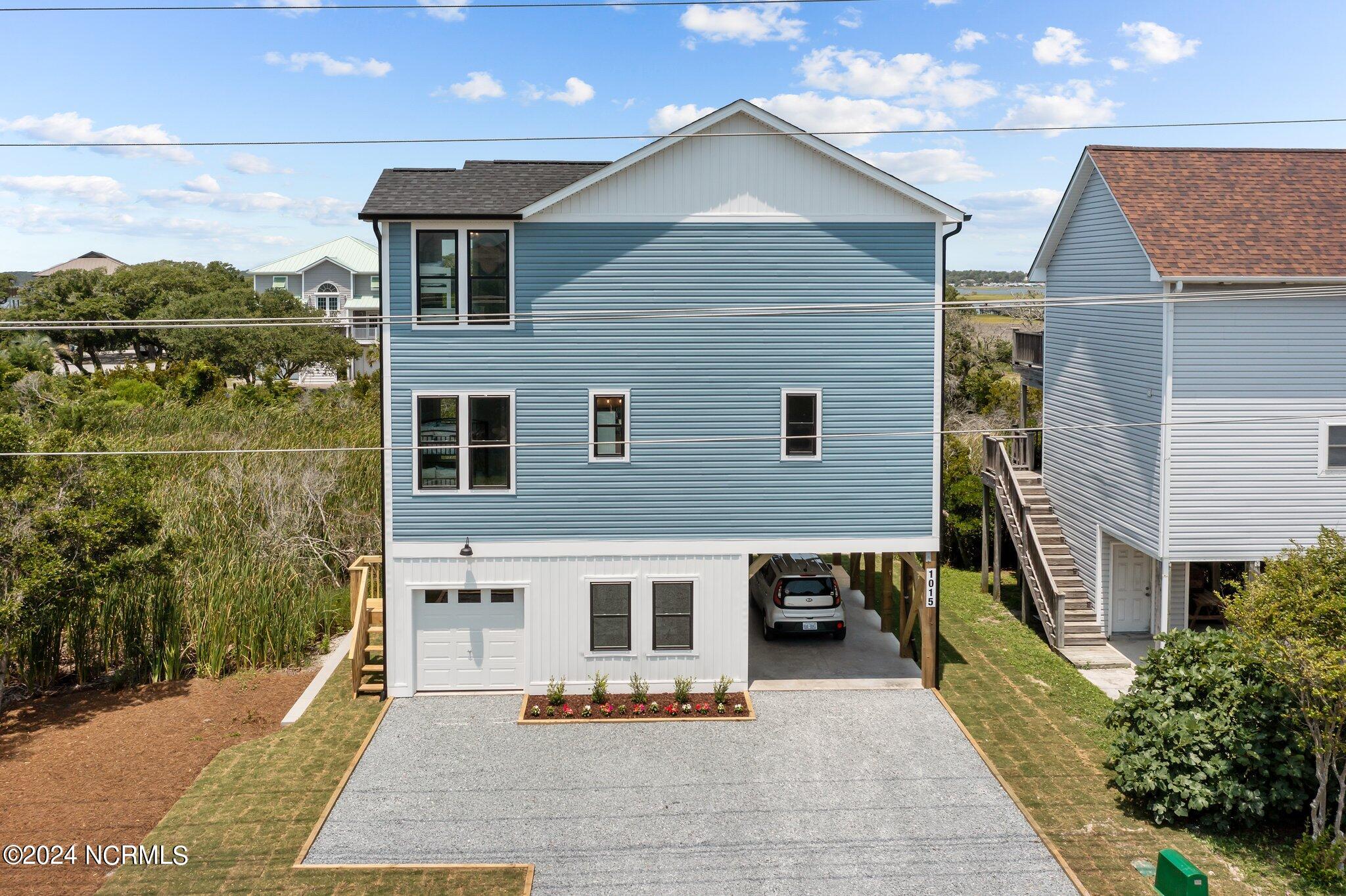 1015 S Topsail Drive Property Photo 1