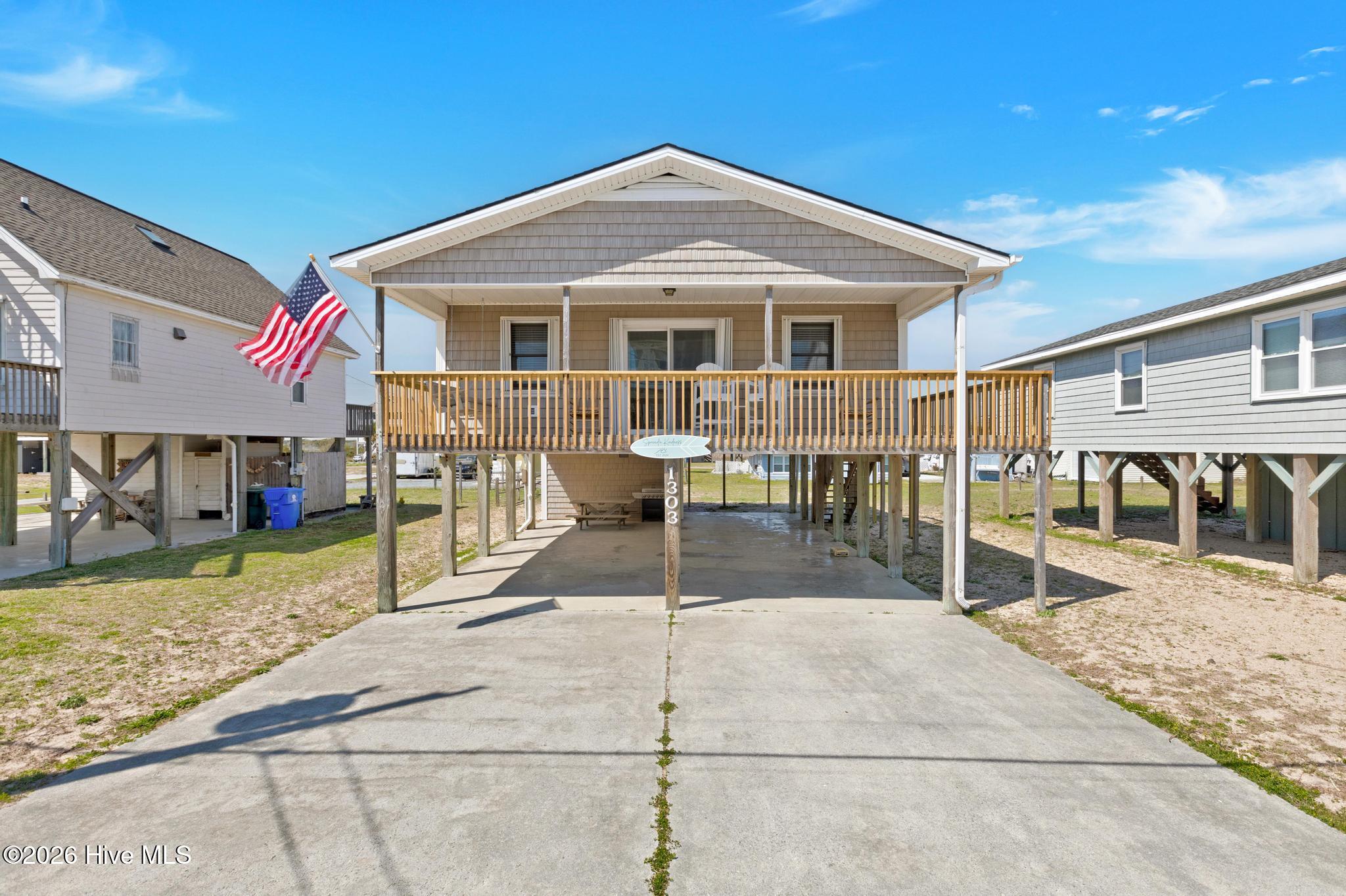1303 N Topsail Drive Property Photo 1