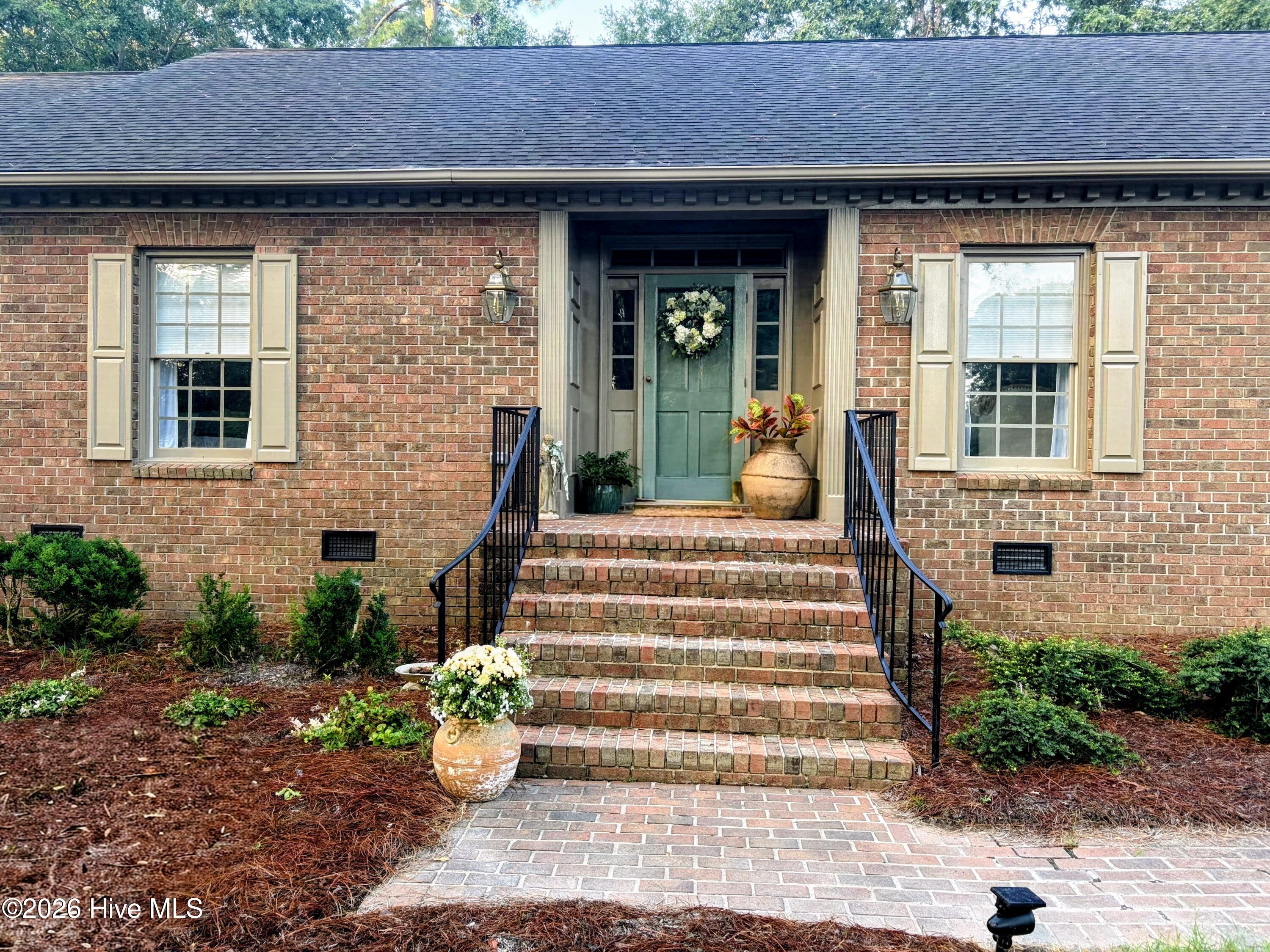 5050 Country Club Drive N Property Photo 1