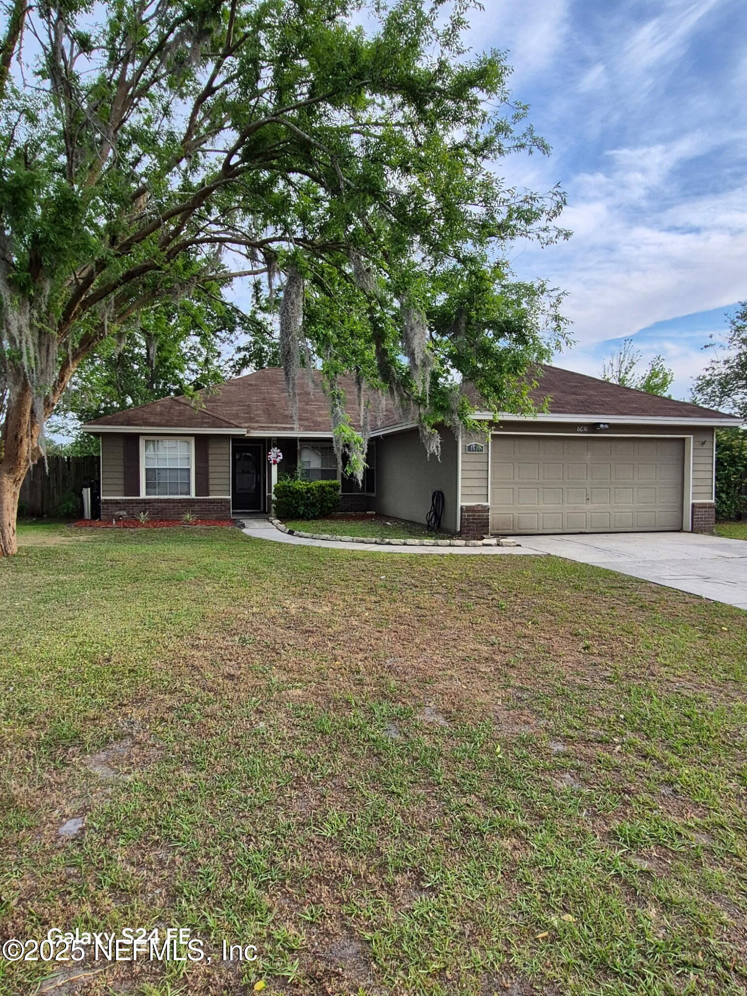 8638 Devoe Street N Property Photo 1