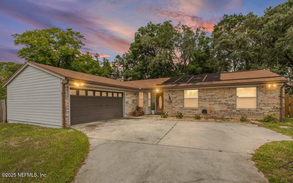 11155 Windy Oaks Drive W Property Photo 1