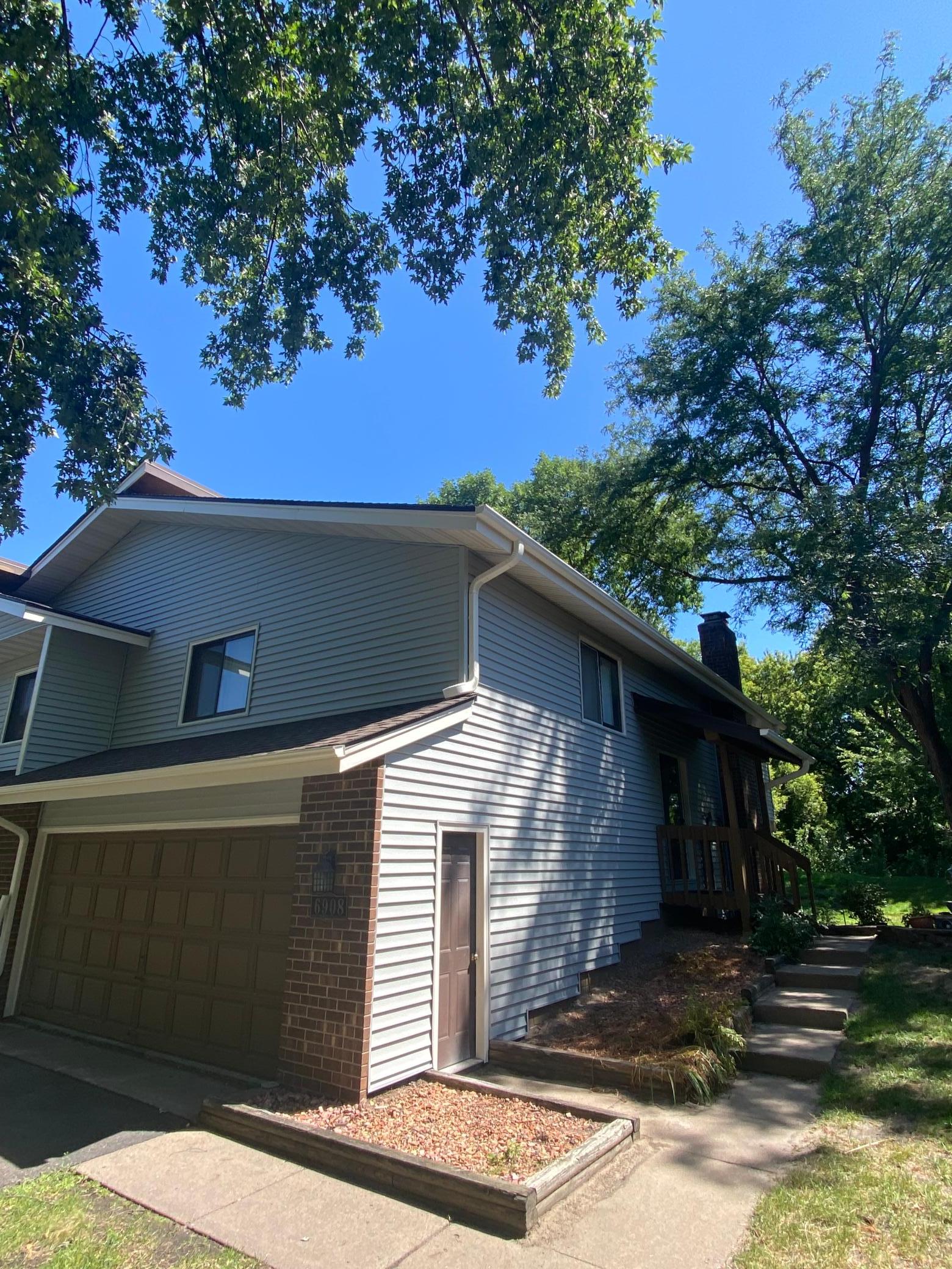 6908 Unity Avenue N Property Photo 1
