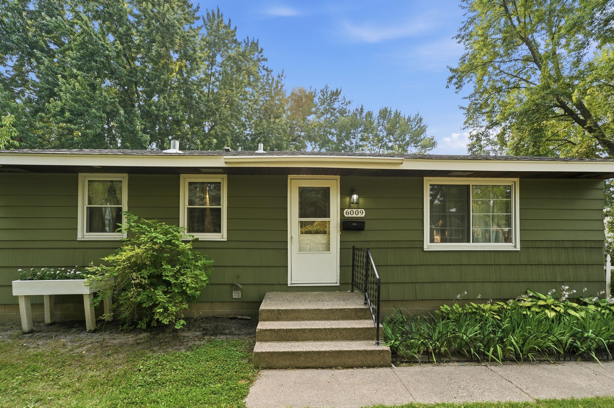 6009 Quebec Avenue N Property Photo 1
