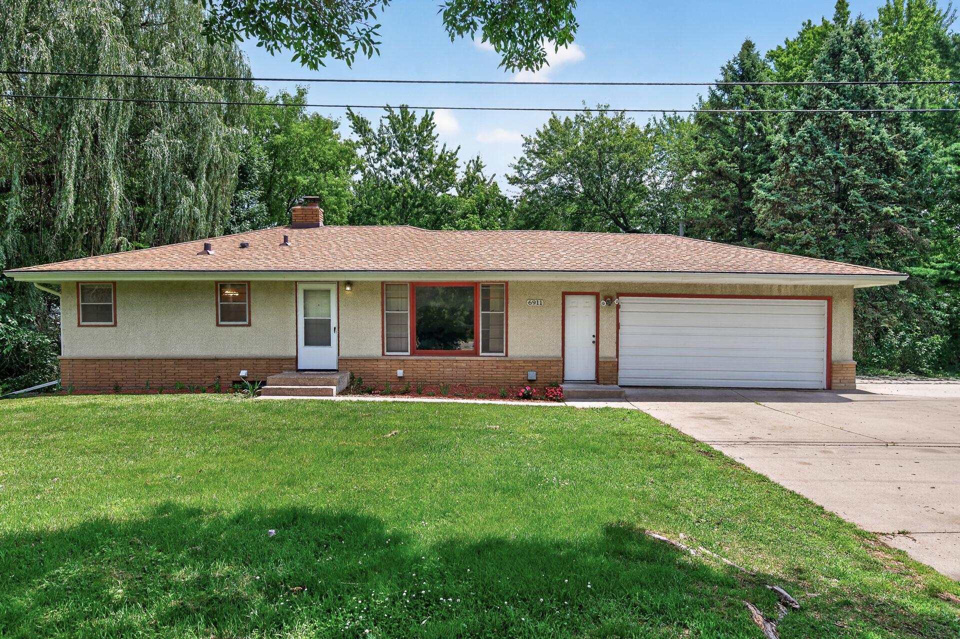 6911 E River Road Ne Property Photo 2