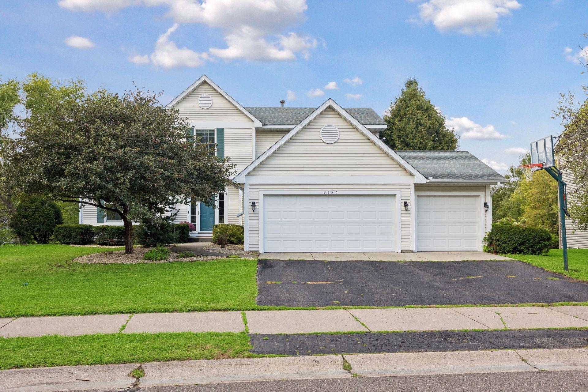 4635 Queensland Lane N Property Photo 1