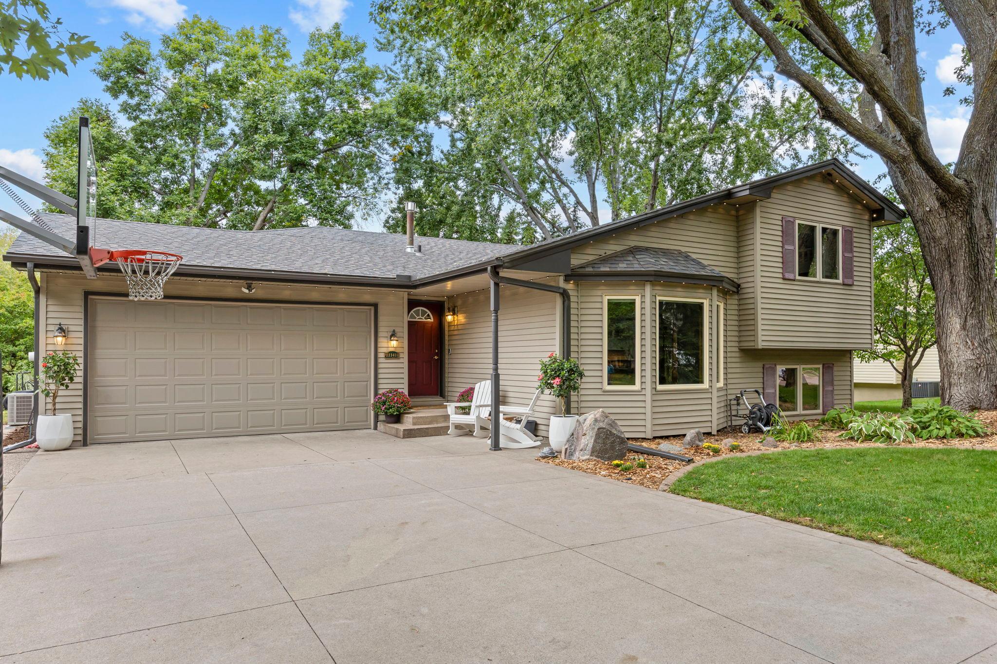 11141 Xylon Avenue N Property Photo 1