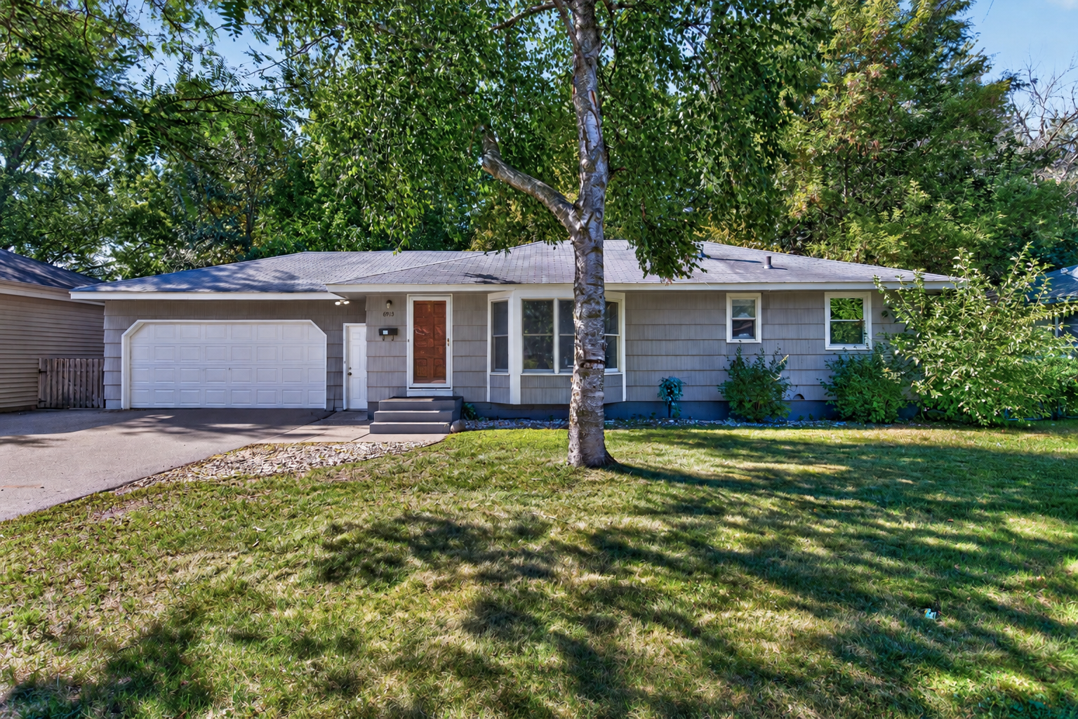 6913 Toledo Avenue N Property Photo 1
