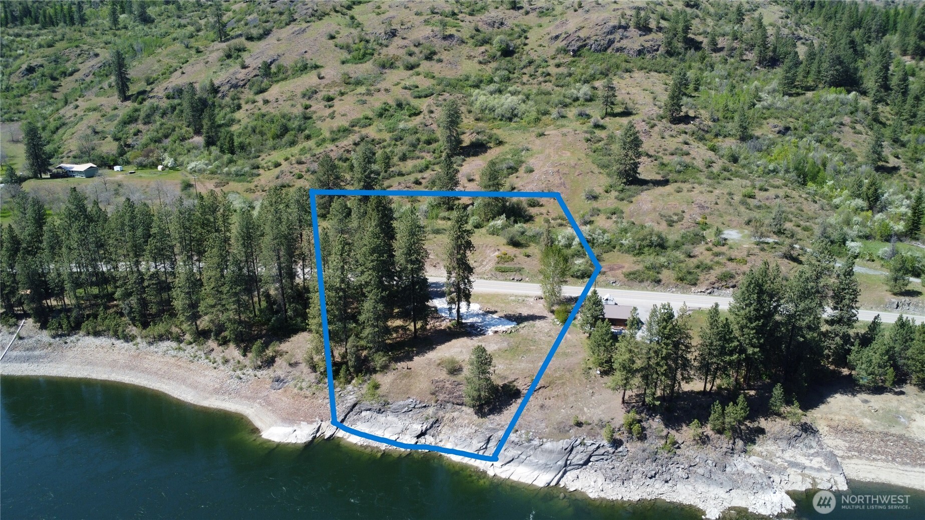 4239 Northport Flat Creek Road Property Photo 1