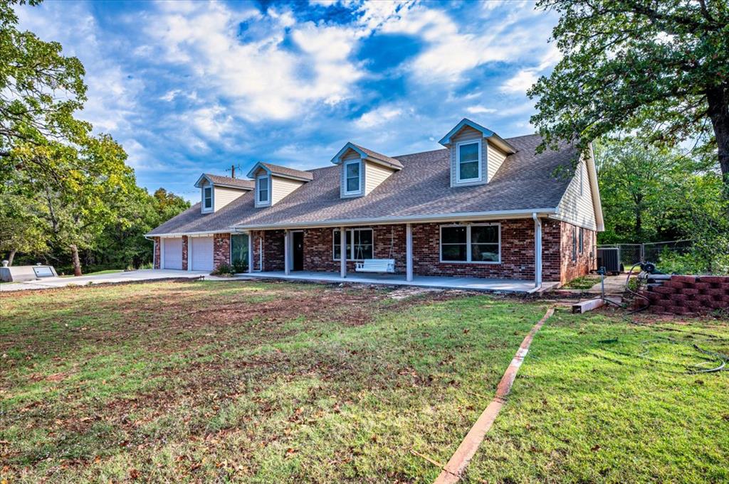 8000 N Harrah Road Property Photo 1