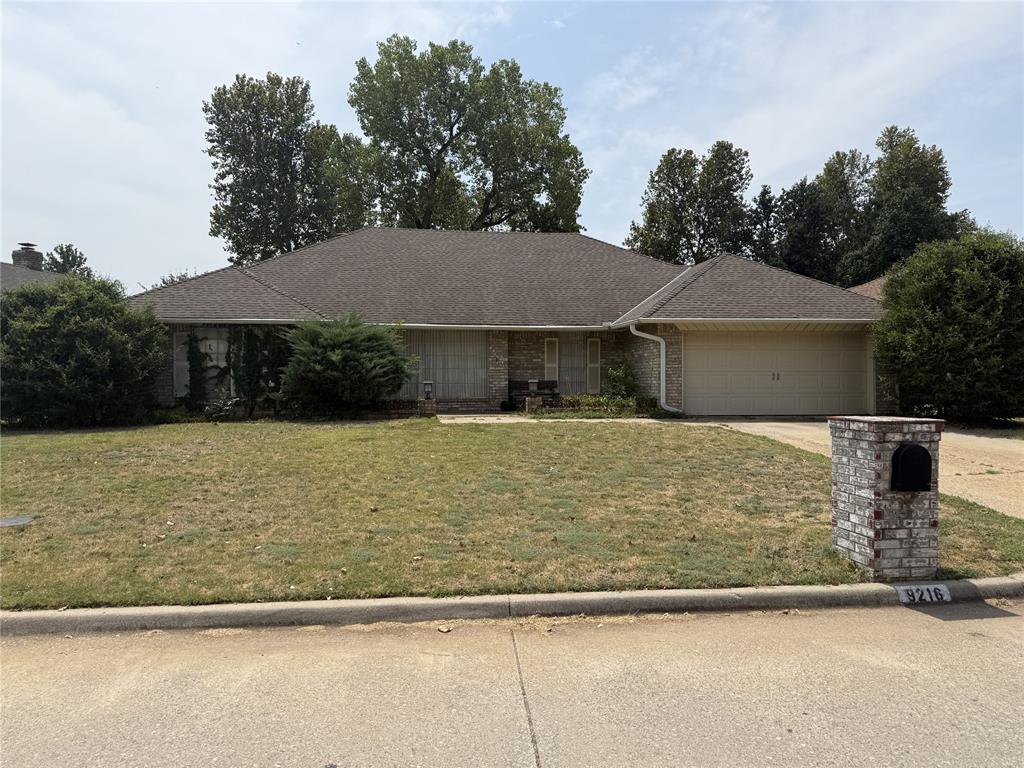 9216 NW Lansbrook Lane Property Photo 1