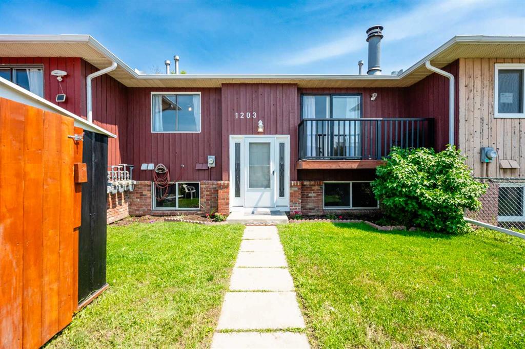1203 44 Street E Property Photo 1