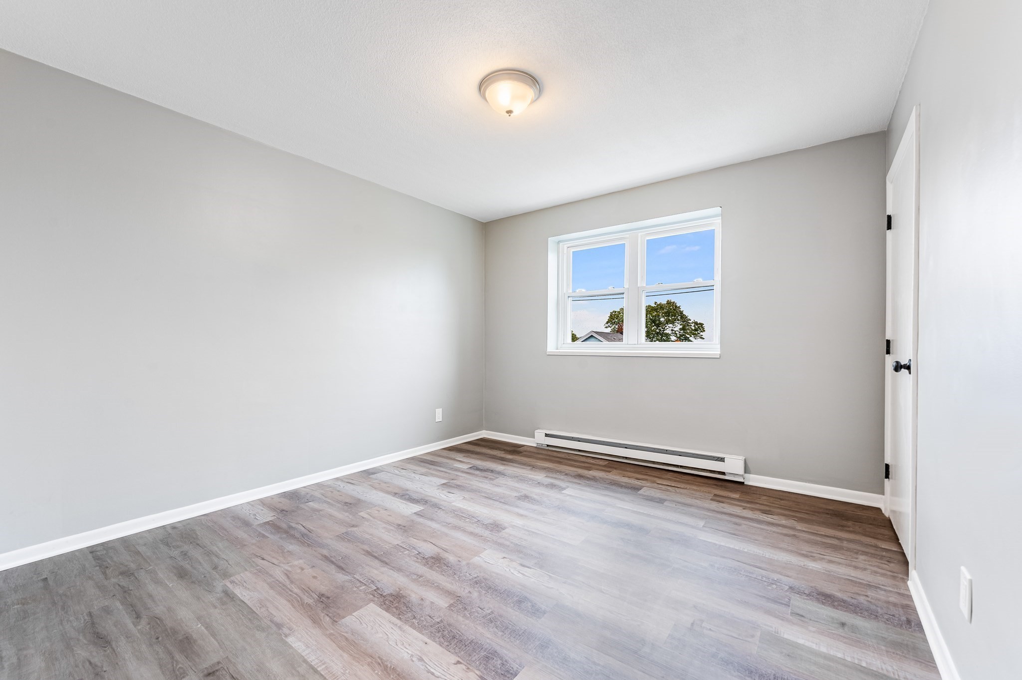 16 Waldemar Ave # 104 Property Photo 1