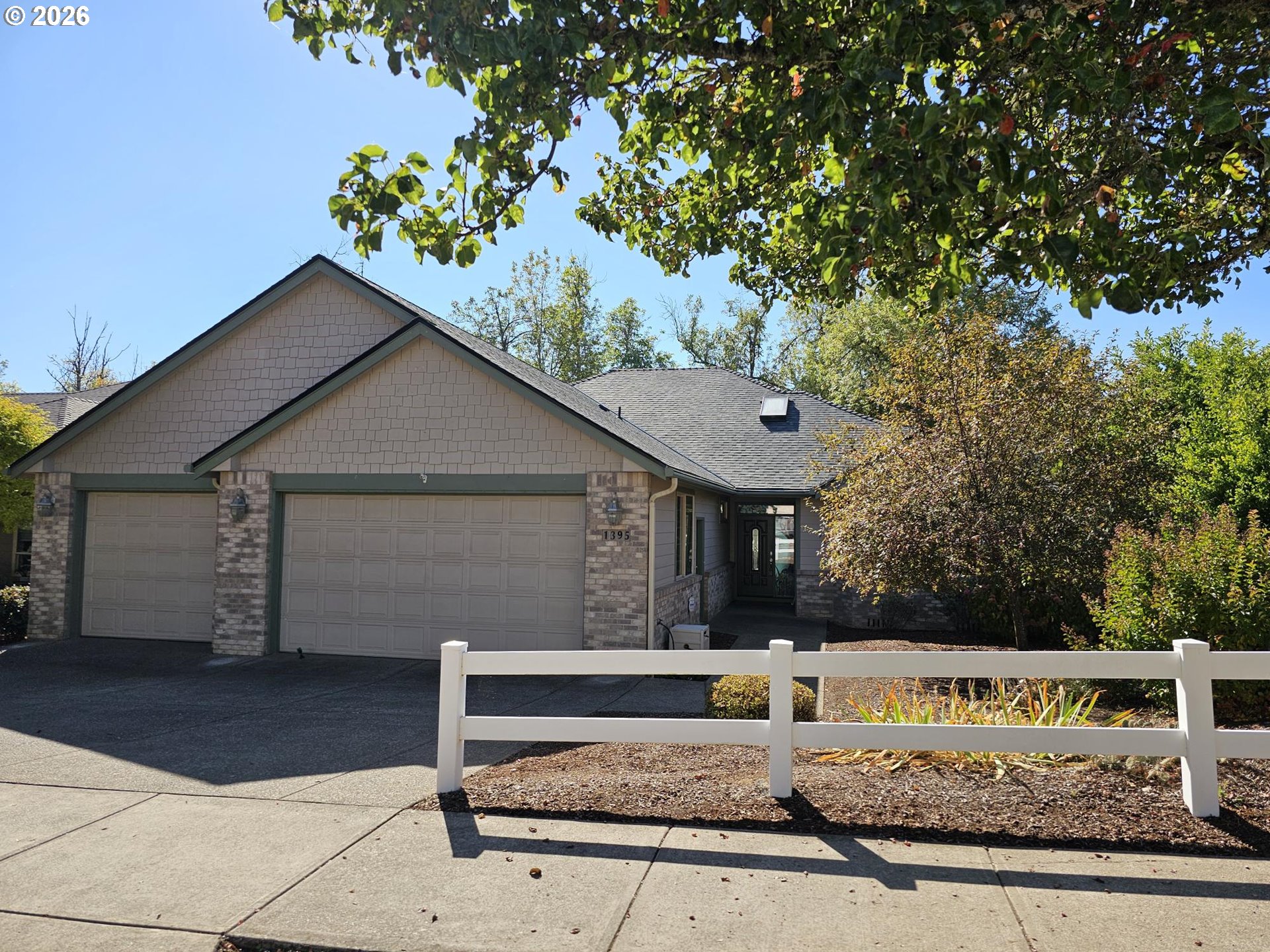 1395 NW WEST MEADOWS DR Property Photo 1