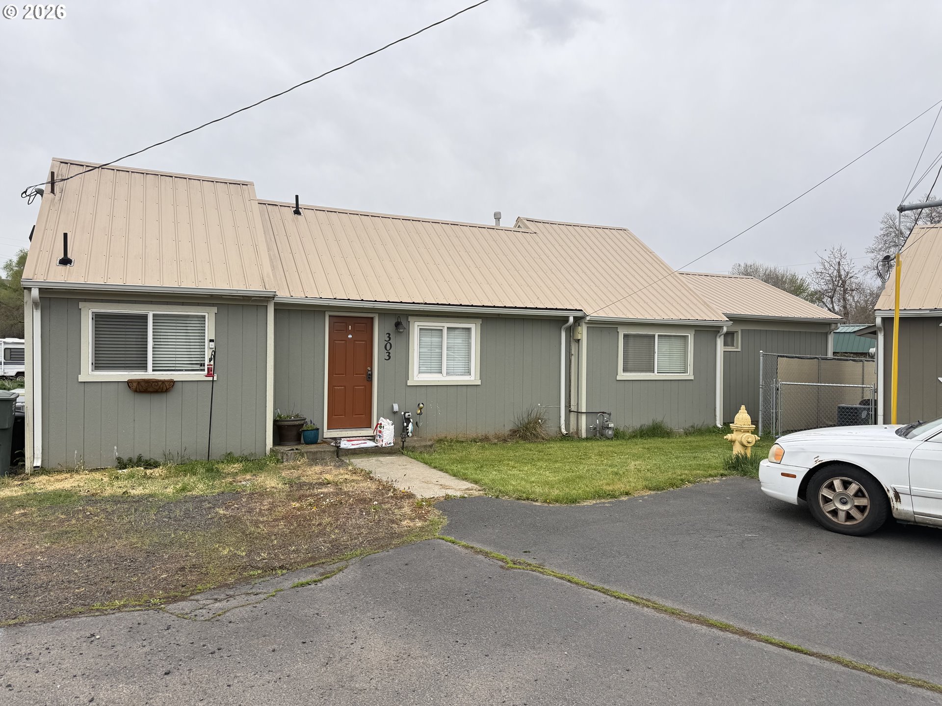 303 Ne Anvidon St Property Photo 1