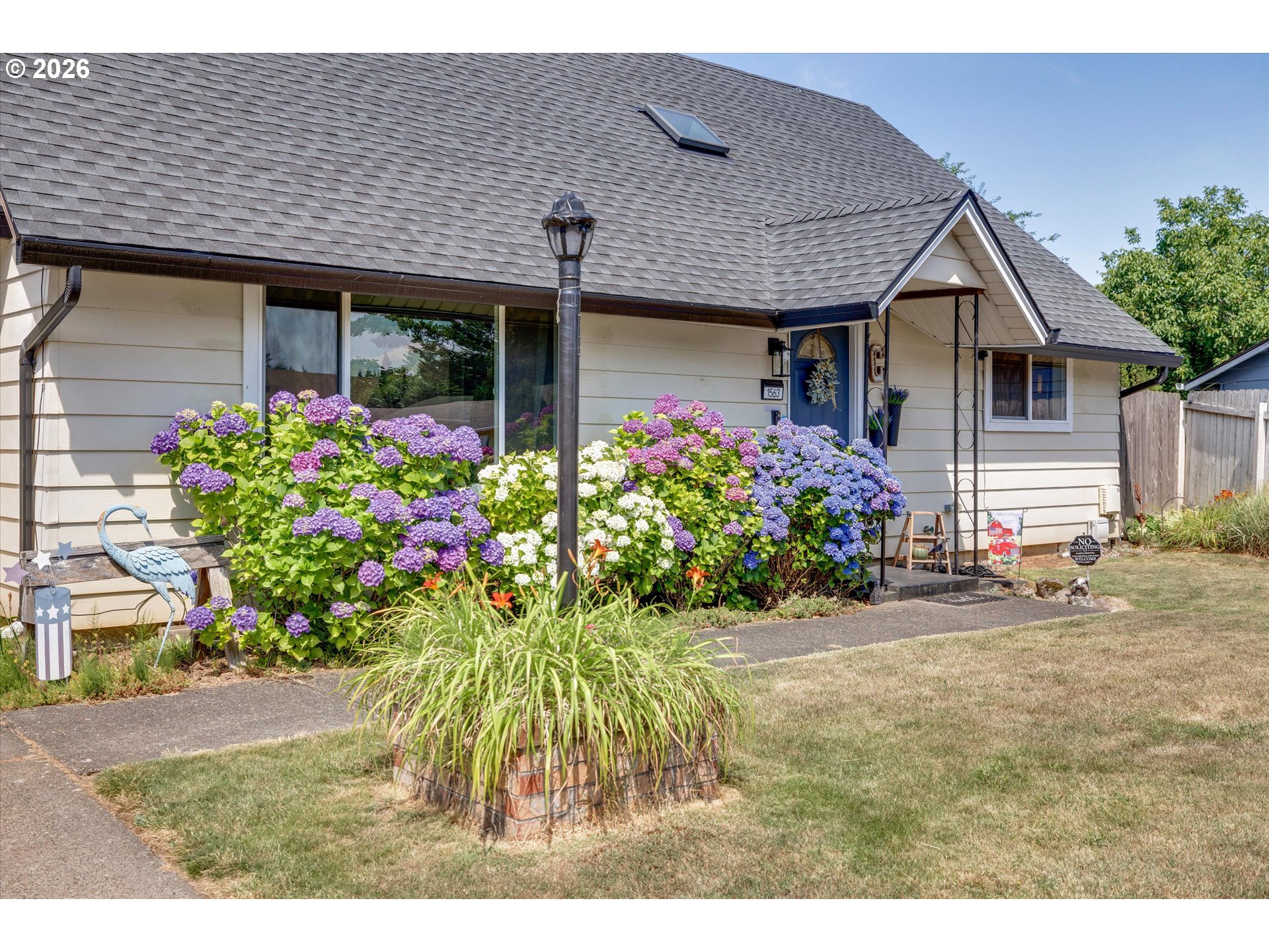 1563 NE VILLAGE SQUIRE CT Property Photo 1