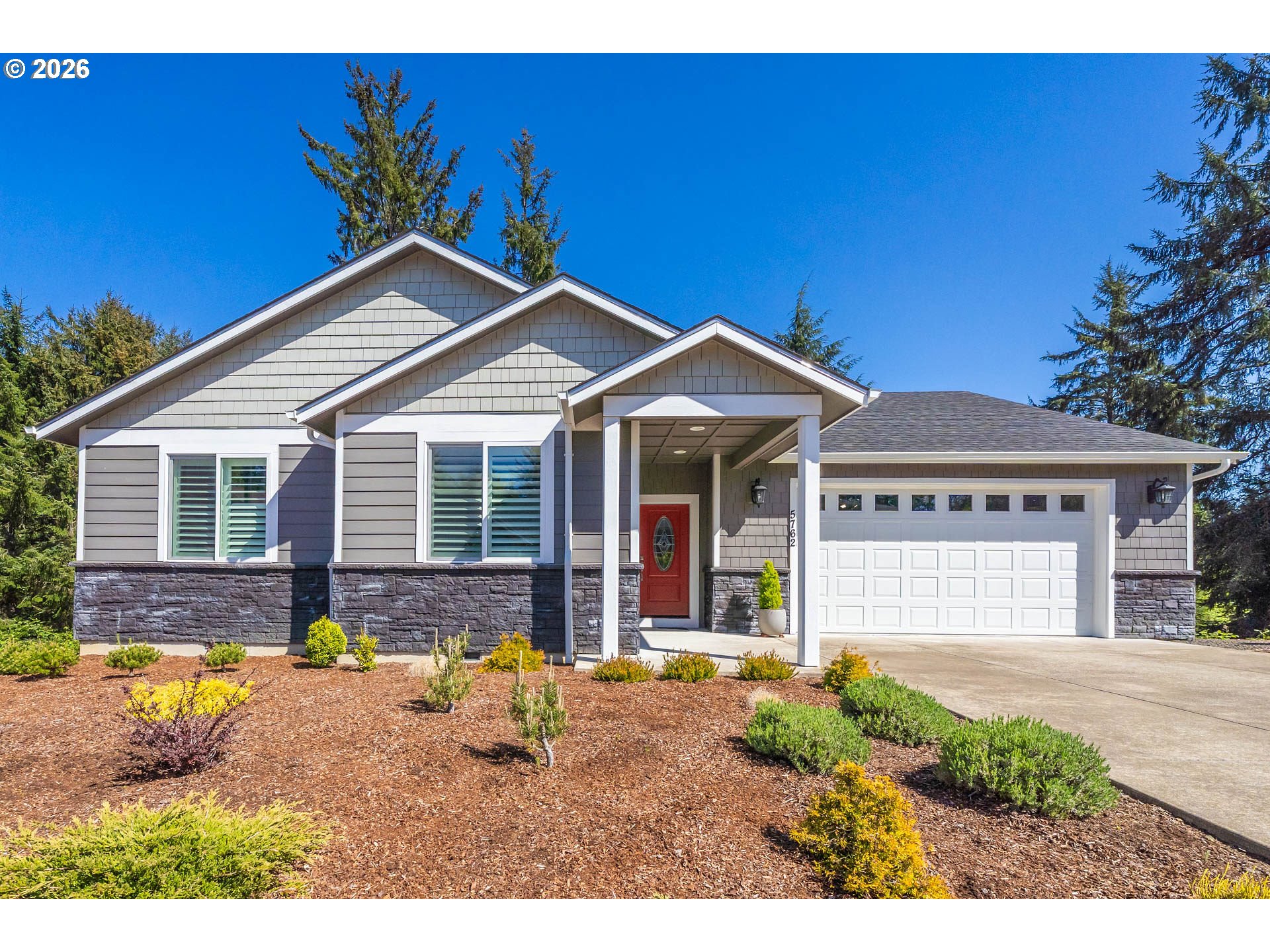 5762 NE VOYAGE WAY Property Photo 1