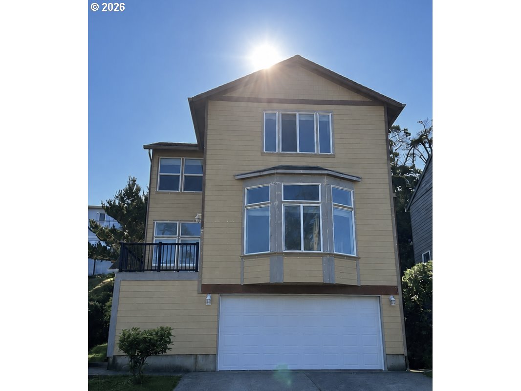 4536 SW BEACH AVE Property Photo 1