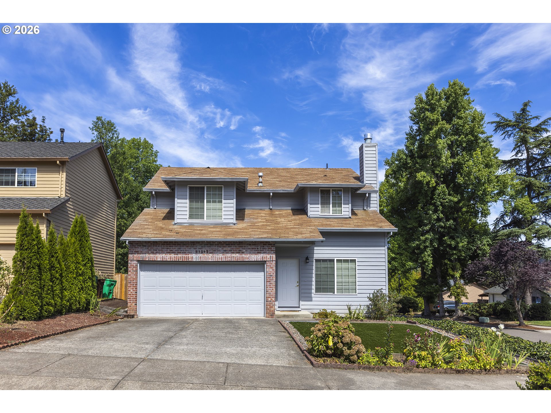 11595 Se Springcrest Dr Property Photo 1