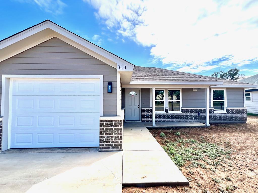 313 E 25th St Property Photo 1