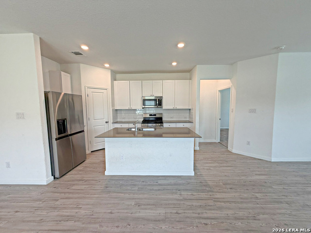 12931 ROSEMARY BND Property Photo 1