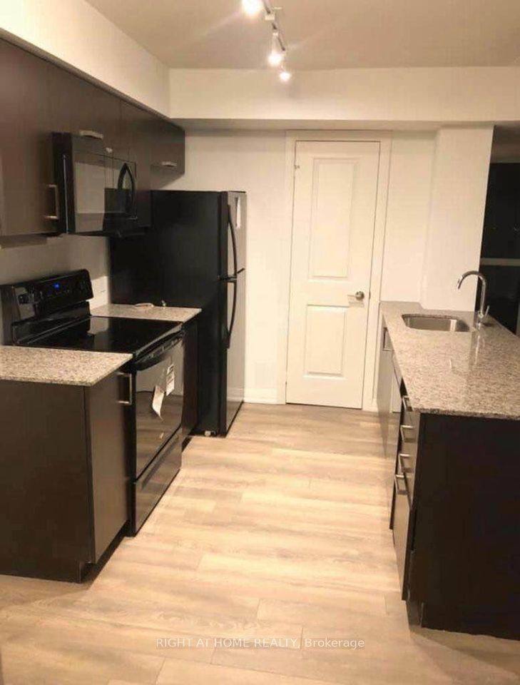 #718 - 30 Meadowglen Place Property Photo 3