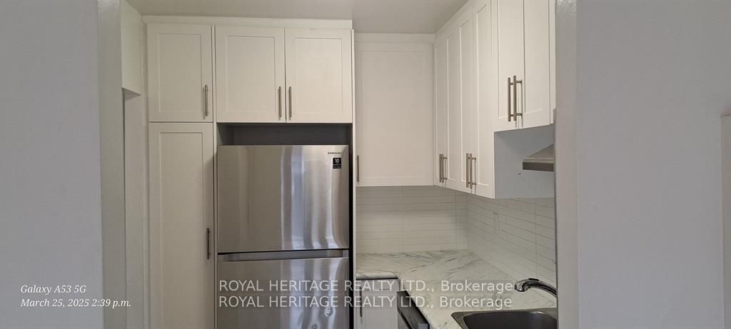 #101 - 945 Simcoe Street Property Photo 1