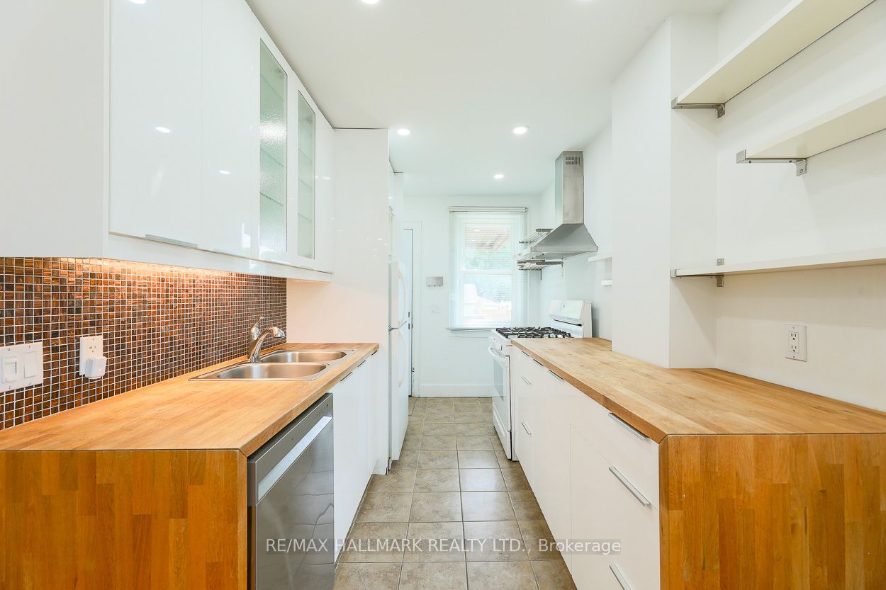 2159 Gerrard Street E Main Property Photo 2