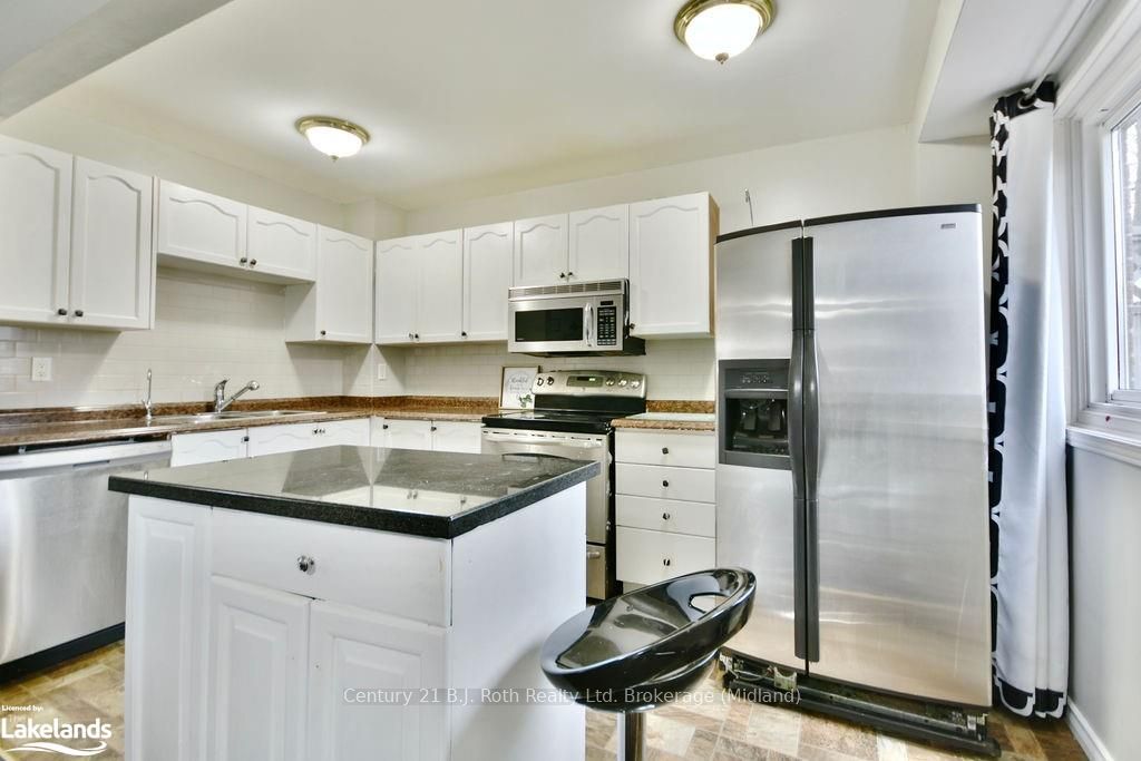 #7 - 441 Barrie Road Property Photo 7