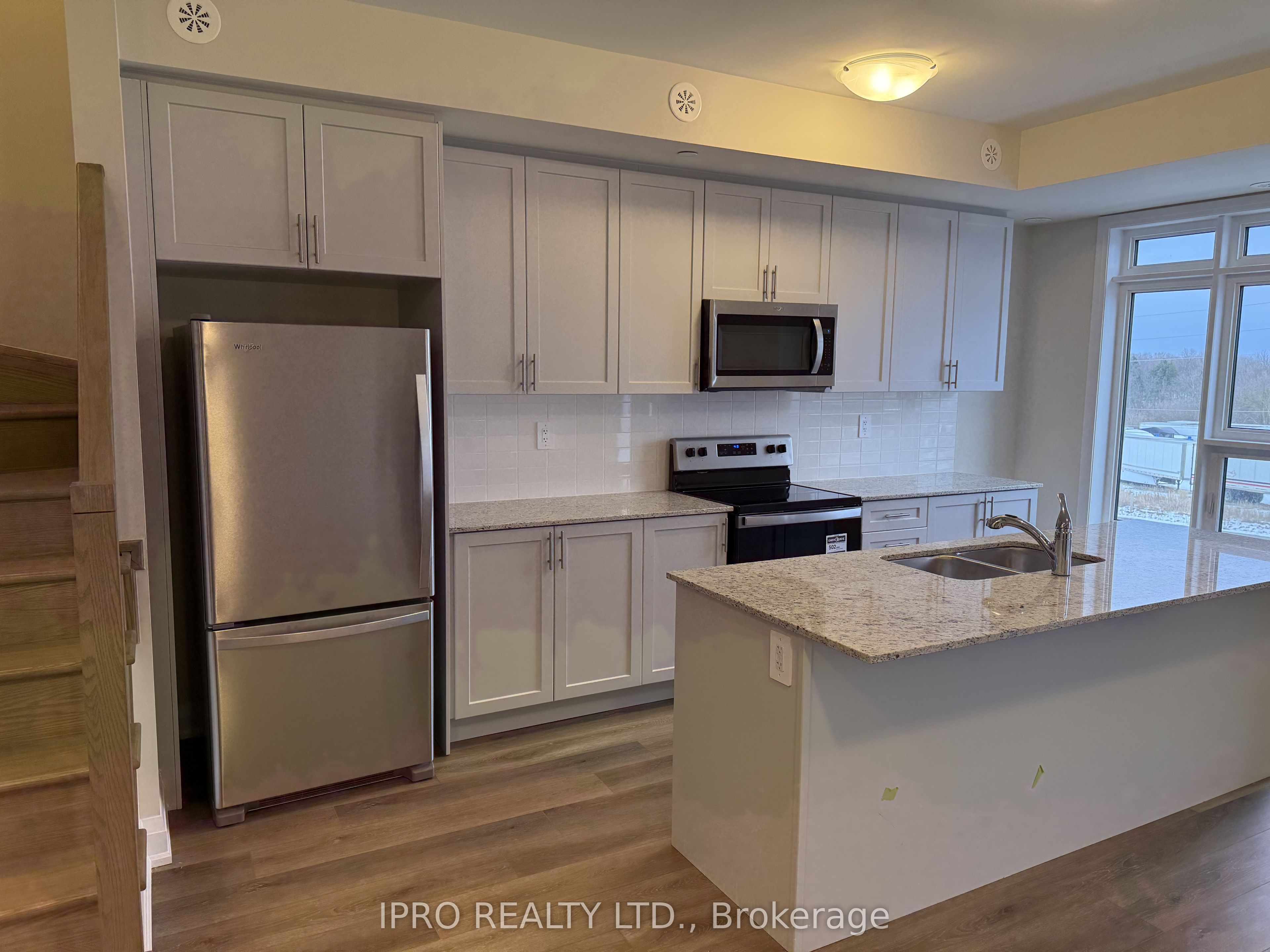 #115 - 1581 Rose Way Property Photo 2