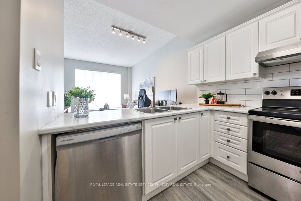#102 - 4198 Dundas Street Property Photo 8