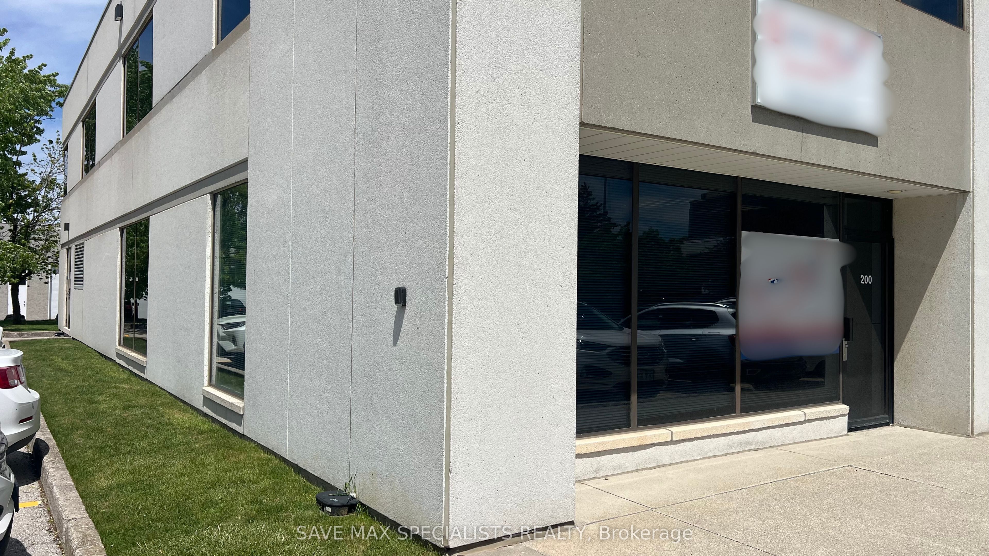 #200 - 2595 Skymark Avenue Property Photo 2