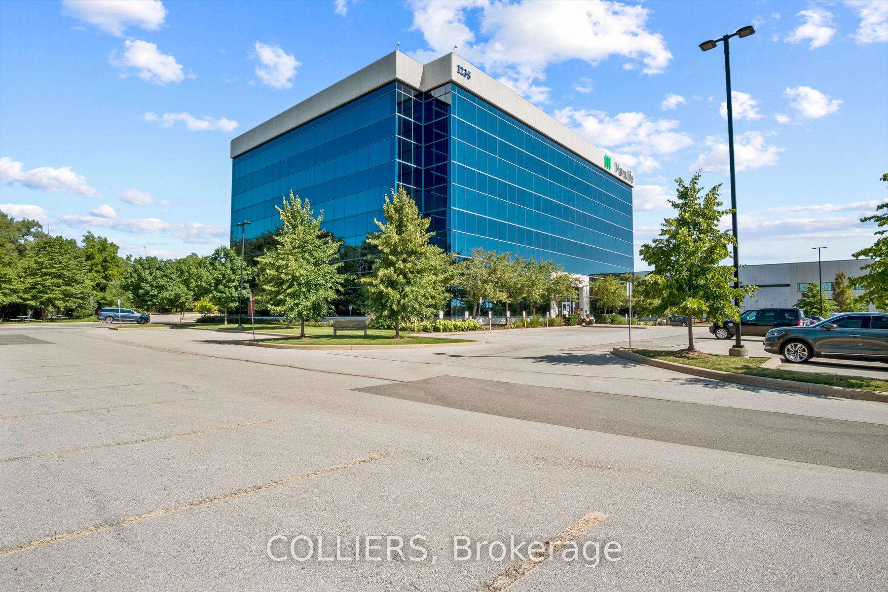1235 North Service Road W 302 Property Photo 1